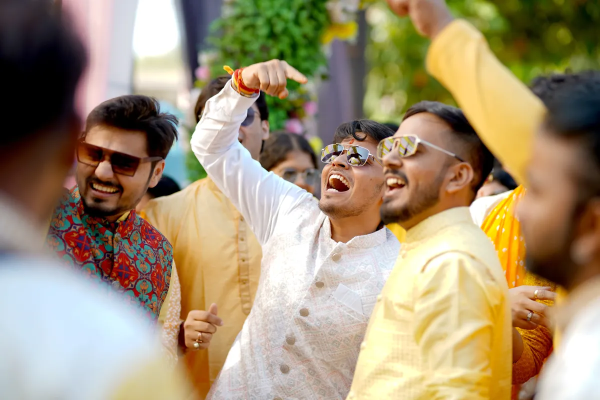 Groom dancing energetically during Haldi ceremony at Jodhpur destination wedding